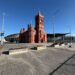 The Pierhead Building and Senedd in Cardiff Bay, with the Wales Millennium Centre in the background.